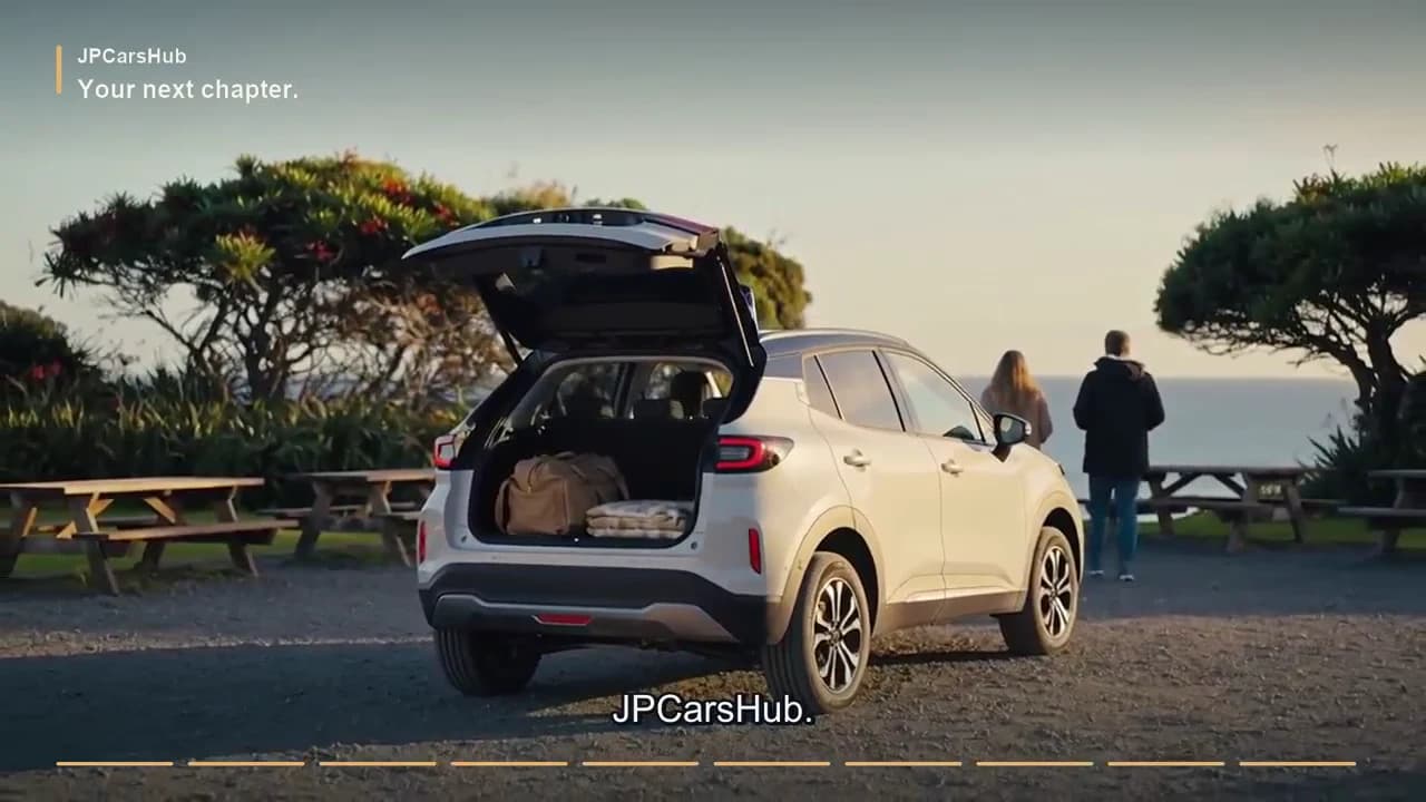 JPCarsHub film: a car and travellers beside the coast